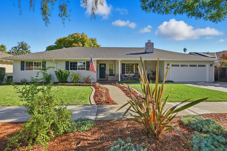 Welcome to this beautifully remodeled 4 Bedroom ranch style home on a tree lined street in Willow Glen. This spacious home offers a flexible floor plan with separate living and family rooms plus an additional office/den/flex space. The open kitchen features a large quartz island with a waterfall edge and seating, stainless steel appliances, abundant cabinetry, and generous counter space. The dining area flows seamlessly into the living room with a cozy fireplace and large picture windows that fill the home with natural light. The home includes two primary suites. The main suite offers double closets, French doors leading to a private outdoor seating area, and a luxurious bathroom with dual sinks, a glass-enclosed shower, and tile accents. The junior suite features a spacious closet and an updated bath with a glass stall shower. Enjoy the backyard designed for California living, with multiple spaces for entertaining, dining, and relaxing, plus grass and garden areas. Additional highlights include recessed lighting, new interior paint, electric car charger, indoor laundry, cedar lined closets, multiple sets of French doors connecting indoor and outdoor spaces, water softener and so much more.  This is truly one you will want to see!