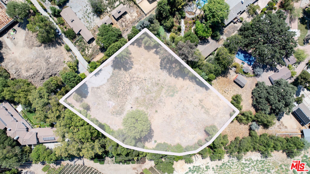 Attention all developers, investors, and end-user homebuyers seeking an RTI-ready property! Nestled on a secluded enclave just off Long Valley Road in prestigious Hidden Hills, this prime opportunity with endless possibilities for crafting a dream home. The existing site is off a private road on a 1.16-acre lot site awaits it's transformation. Provided plans are to build a two-story 14,310 sq. ft home with a private circular gated driveway, attached 4 car garage, Pool, Spa, and Detached ADU. Don't miss your chance to stake your claim in this coveted, star-studded neighborhood.