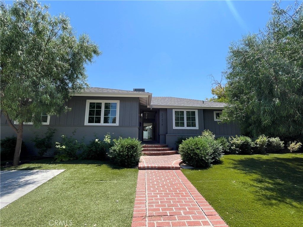Welcome to 22678 Kittridge St — a beautifully renovated and freshly repainted 4-bedroom, 3-bathroom home in the heart of West Hills, offering approximately 1,900 sqft of bright, open living space. This inviting residence features an expansive living and dining area, a modern kitchen with quartz countertops, sleek cabinetry, and stainless steel appliances, as well as updated bathrooms throughout. Step outside to enjoy a private pool, spacious patio, and landscaped yard ideal for relaxing or entertaining. The primary suite includes a private en-suite bathroom, and the home offers a front driveway with a carport for parking, plus ample street parking; the side driveway is reserved for the separately rented, permitted ADU with its own entrance and address. Situated on a quiet, tree-lined street just minutes from top-rated schools, shopping, dining, and parks, this home blends style, comfort, and convenience, and is available now for qualified tenants.
