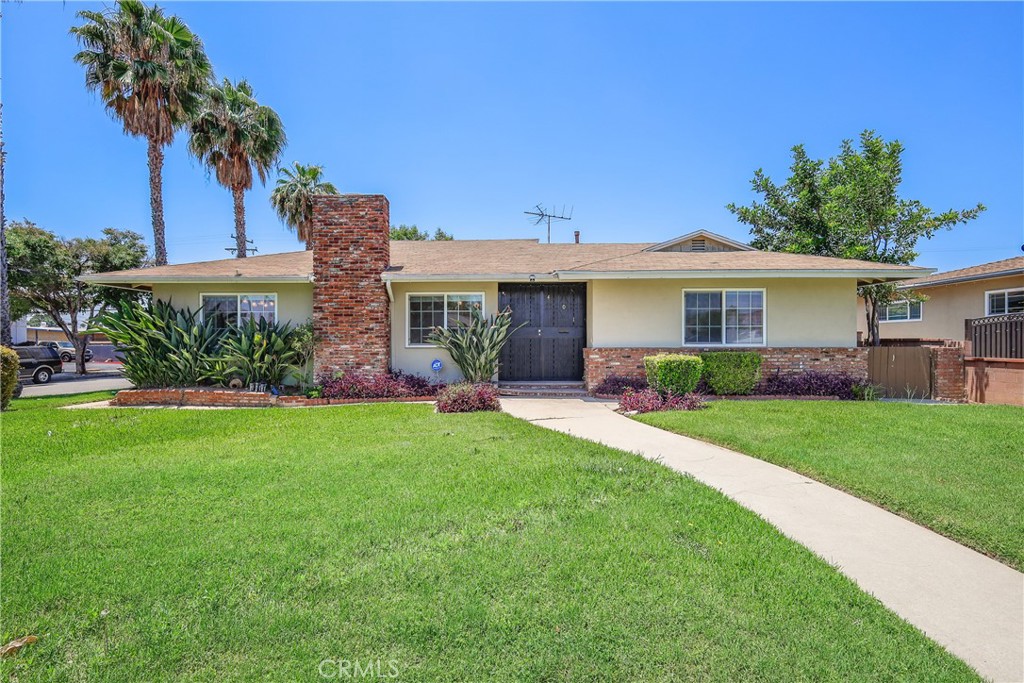 Two homes on a corner lot! Nestled in West Covina, this property features a 1,532 sq ft main house—completely remodeled in 2019—with three bedrooms and two bathrooms, and a brand-new, 1,200 sq ft ADU (built in 2025) also consisting of three bedrooms and two bathrooms. Solar Panel is purchased and installed in ADU.
The main house welcomes you through a rich-wood front door and chandelier-lit foyer into an airy living room with laminated hardwood floors and a stone fireplace. This space flows into a bubble-chandelier-illuminated dining nook and a galley kitchen appointed with solid-wood cabinetry, granite countertops, stainless-steel appliances, and striking black-and-tan tile floors. You’ll find three spacious bedrooms—including a master suite with a dual-vanity, marble-tiled bath—plus a second fully updated bathroom.
A secure courtyard leads to the new ADU, which offers its own three bedrooms, two baths, and individual AC units in each room, plus a two-car garage with laundry hookups—all just minutes from the 10 Freeway.