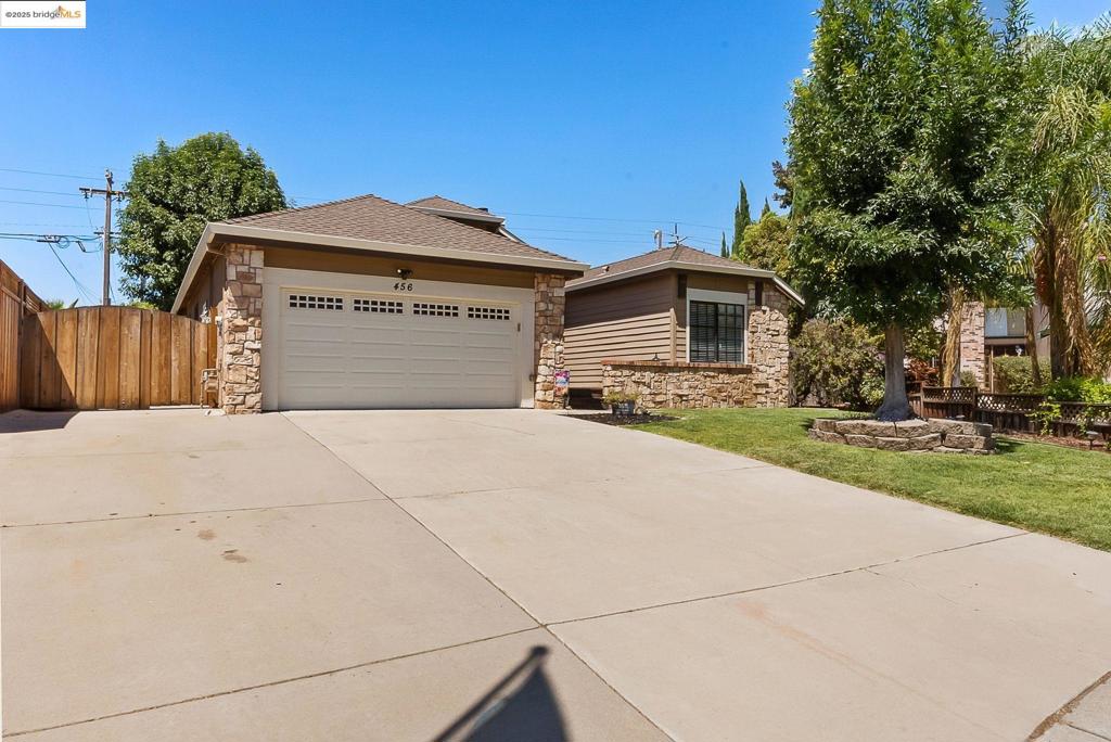 Welcome to this beautifully maintained single-story home situated on a premium lot spanning over a ¼ acre. This 3-bedroom, 2-bath property features an open-concept layout that seamlessly blends living, dining, and kitchen spaces, perfect for both everyday living and entertaining. The spacious primary suite offers a private retreat with direct access to the backyard, ideal for morning coffee or evening relaxation. The expansive lot offers plenty of outdoor space for gardening, play, or unwinding in your own private backyard retreat. Step out back and beat the heat, cool off in the refreshing plunge pool with a custom-built deck, perfect for summer days and weekend lounging. Outside, the wide driveway provides ample space and the potential for RV or boat parking. Energy-efficient owned solar adds to the home's appeal, helping you save on utility costs. Adjacent to Laurel Ballfields and Oakley's newest shopping center, coming soon! Don’t miss this rare opportunity to own a move-in-ready single-story home on a generously sized lot in a desirable location of Oakley!