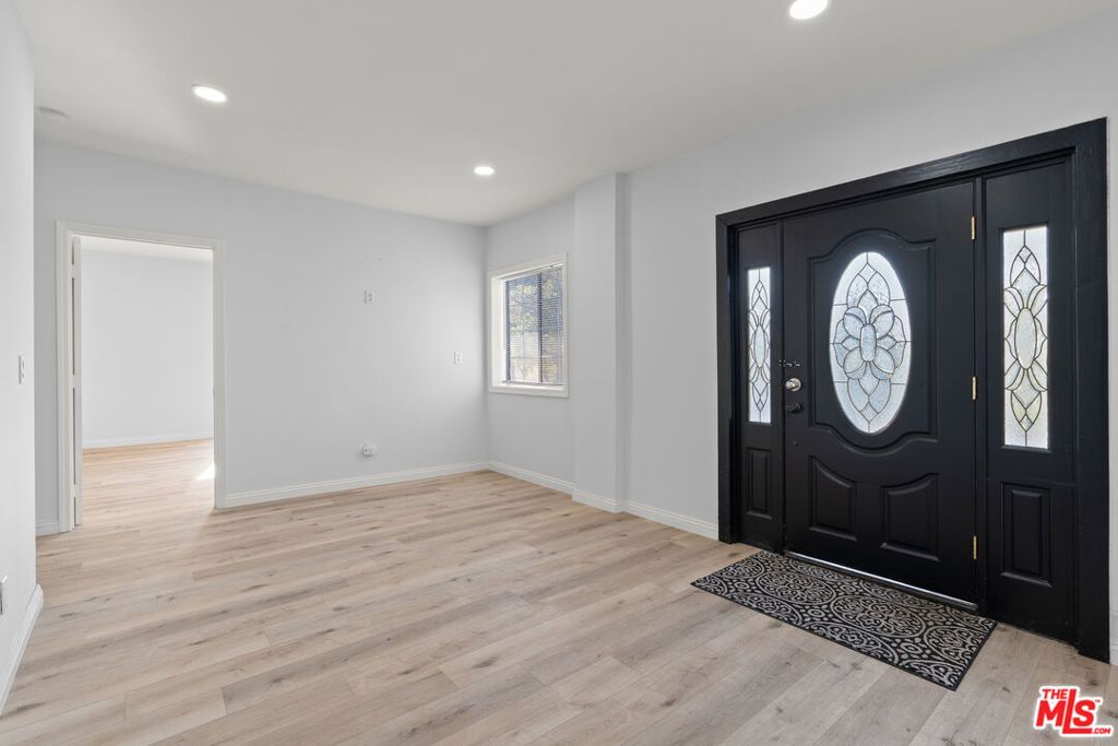 Photo of 1250 S Windsor Boulevard, Los Angeles, CA 90019 (MLS # 25538065)