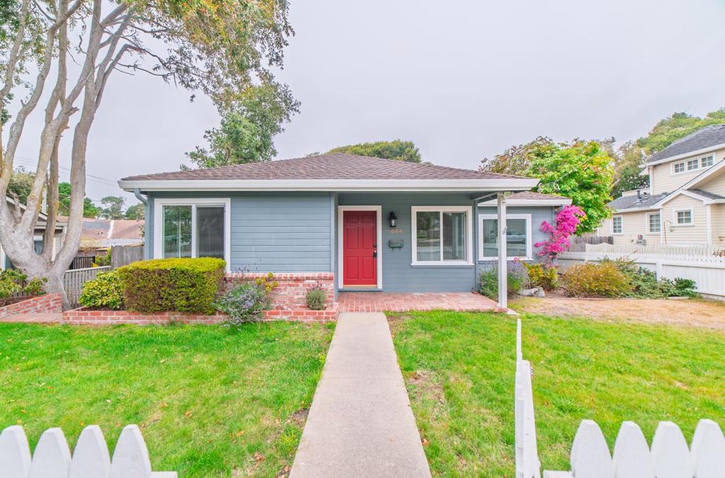 Discover charming living in beautiful Pacific Grove with this delightful 2-bedroom, 1-bathroom home, offering a comfortable 998 sq ft of living space on a 5000 sq.ft. lot. This home includes beautifully refinished wood floors, new vinyl flooring in the bathroom and kitchen, fresh interior paint, and comfortable living and dining room areas. The kitchen has new stainless steel appliances including a new gas range, hood, dishwasher, and refrigerator. There is a laundry area off the kitchen, an enclosed yard, and a detached 2-car garage for convenient parking and storage. This home is very near Washington Park, and not far from downtown Pacific Grove, with all it has to offer.