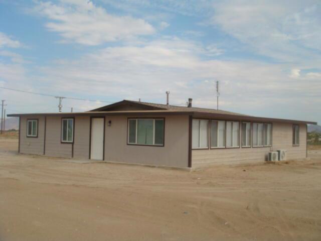 FANTASTIC 3 Bedroom 2 Bathrooms on 5 ACRES OF LAND and ON PAVED ROAD. Beautifully remodeled and MOVE IN READY!New Paint, New Flooring, New Kitchen, New Bathrooms, New A/C mini splits, New Plumbing and Electrical, New Drywall, New Ceilings and Lighting, New Well Equipment and a 400 sq. ft. Storage Unit. Do Not Miss Out On This One....................... VIEWS ALL AROUND YOU !!!!!!!!!!!!!!!!1