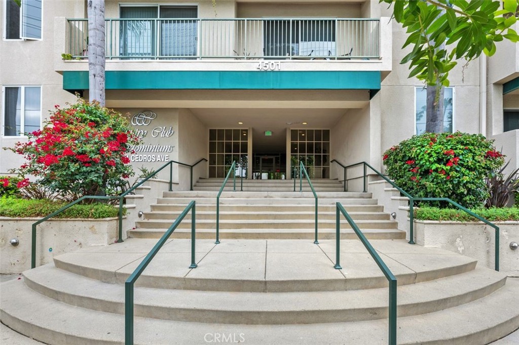 WELCOME HOME! Top-Floor Living in Sherman Oaks Village. This beautifully updated, light-filled one-bedroom condo in the coveted Country Club Condominiums offers prime living just one block from Ventura Blvd. Enjoy walkable access to acclaimed restaurants like Anajak Thai Cuisine, Daisy, and many more. The open-concept kitchen and bar feature NEW QUARTZ COUNTERTOPS and appliances, seamlessly connecting to the light and airy living room, which faces north for optimal natural light. A LARGE SLIDING GLASS DOOR leads to an inviting outdoor balcony with neighborhood and distant mountain views. Thoughtful updates include WATERPROOF LUXURY VINYL FLOORING in the kitchen, bathroom, and laundry space, while the living room and bedroom boast NEW CARPET, fresh PAINT, and UPDATED BASEBOARDS. The bedroom offers ample storage alongside a walk-in closet. The renovated bathroom features a NEW VANITY with QUARTZ top, modern SINK, updated FAUCETS, and stylish LIGHTING. Convenience is key with IN-UNIT WASHER/DRYER HOOKUPS tucked in a hallway closet between the bedroom and bathroom. A central elevator provides easy access from the GATED subterranean garage, where you'll enjoy a PREMIUM assigned PARKING SPACE. Additional guest parking is available within the security gate, and since this is the only multifamily residence on the street, abundant street parking ensures effortless hosting. This well-maintained community, with ON-SIGHT management, offers fantastic amenities, including a POOL, CLUBHOUSE, BILLIARDS, BARBECUE area, and a fully equipped GYM. HOA fees cover insurance, water, trash, antenna, and SPECTRUM INTERNET, plus two XUMO Stream Boxes. Experience exceptional living in one of the most vibrant locations in Sherman Oaks!
