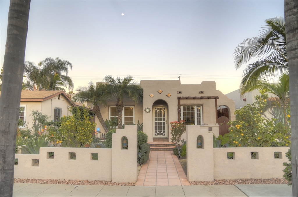 Treasured adobe Casita Bonita in Kensington, 3 blocks to shops & restaurants in the village on Adams Ave. Turn-key home. Surprisingly spacious sitting & dining rooms, filled with natural light from many windows. 2 bedrooms with Jack & Jill bathroom. Front bedroom French doors make it perfect office or guest bedroom. Entertain outside with custom flagstone seating area by soothing fountain. AL fresco dining on the expansive Trex deck. A gardener’s delight with organic fruits and vegetables. Fruit trees include Meyer lemon, persimmon, pomegranate in the backyard, also grapefruit, lime, pink lemonade lemons and Santa Rosa plums in the front. Hand made mosaic artwork (Please make offer on it), compass rose and decorative details lovingly designed by the owner. Many upgrades through the house: Foundation upgrade done by Craftsman. Dual pane windows, cellulose insulation in the attic with a brand new PVC reflective roof to keep the house cool in summer and warm in winter. Completely rewired within conduit throughout the house Brand new Trex deck to enjoy San Diego weather. Garage access from the alley. Property zoned for a granny flat.. Neighborhoods: Kensington Equipment: Dryer,Garage Door Opener, Range/Oven, Washer Other Fees: 0 Sewer: Sewer Connected Topography: LL