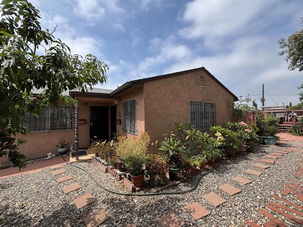 Fantastic corner lot opportunity in the heart of San Diego! Currently used as a single-family residence, this versatile property at 872–74 Duval Street is ready to be restored to its original duplex layout — offering a 2BR/1BA unit + 3BR/2BA unit, totaling approx. 1,850 sq ft on a generous 5931 sq ft lot. Ideal for investors or owner-occupants looking to live in one unit and rent the other. Prime potential for income generation, multigenerational living, or value-add upside. Centrally located close to Downtown, Golden Hill, shops, transit, and freeways. Rare chance to own a duplex in a rapidly developing pocket of 92102 — bring your vision and maximize this property’s future! Located on a corner lot directly across from Gompers Preparatory Academy and Gompers Park, this property enjoys an open, neighborhood feel with great visibility and accessibility. Ally access at the rear each unit has access to its own garage space — perfect for parking or additional storage. An outstanding opportunity to add value, generate income, or create a flexible living arrangement in a rapidly developing San Diego corridor.