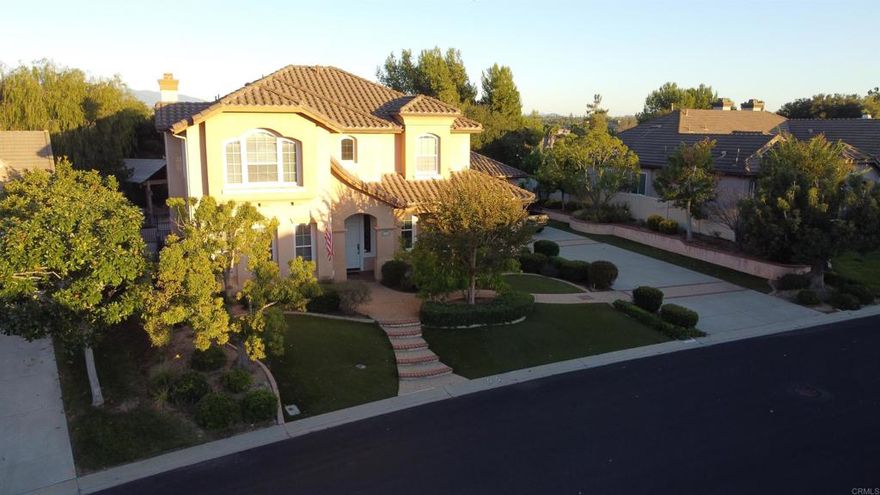 Spacious Peppertree Park luxury home with dynamic views! As you settle in front of the home, you will be awed by the classic curb appeal of the low-maintenance landscaping and wrap-around porch. Inside, this home has so many options. On the first floor you find formal living and dining rooms, a kitchen and family great room, breakfast nook and first floor bedroom nicely connected to the 3-piece bath. The kitchen has been beautifully upgraded with stainless steel appliances and beautiful cabinetry surrounding granite countertops with a roomy walk-in pantry. Upstairs you find the vast primary suite complete with dual vanity, luxurious glass-door shower, soaking tub, walk-in closet, and refinished view balcony. The second-floor secondary bedrooms share a jack-n-jill bath so that each bedroom feels like a suite. And the bonus/flex room upstairs could be a secondary living/family/game/theater room. Inside the Peppertree Park gate and through a gorgeous canopy of trees, you’ll discover the neighborhood of your dreams. The 6-acre park includes basketball, bocce ball, horseshoe pits, greenspace, rose garden, luscious landscaping and walking paths to enjoy it all. Greenbelts separate rows of homes to provide the entire neighborhood with increased privacy.