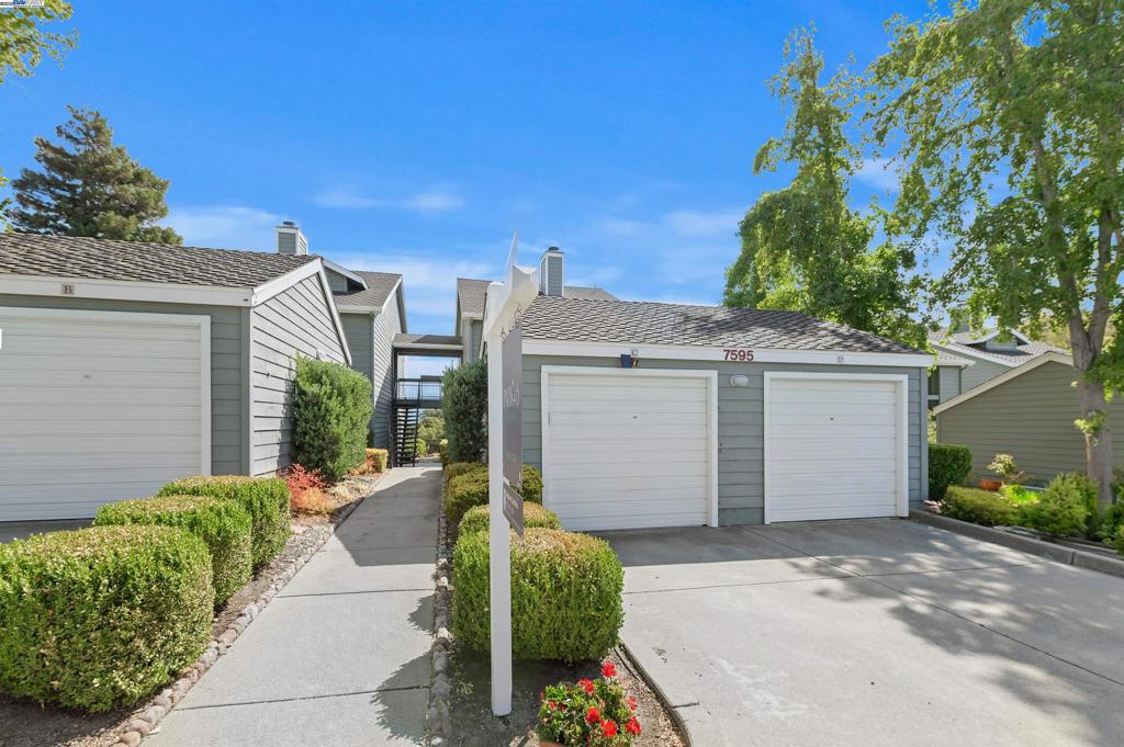 Beautifully updated ground-floor condo in Pleasanton’s desirable Canyon Meadows community! This bright and airy 2-bedroom, 2-bath home features fresh interior paint, luxury vinyl flooring, plantation shutters and a remodeled kitchen with quartz countertops, upgraded cabinetry, new smart oven/air fryer and recessed lighting. The spacious primary suite offers a large walk-in closet and private balcony, while the living room opens to a second balcony—perfect for indoor-outdoor living. Both bathrooms have been remodeled and there is a washer and dryer inside the unit. There is also a new furnace from 2024 and new heat pump. A detached 1-car garage with a private driveway provides secure parking and extra storage. Resort-style amenities include two pools, hot tubs, a fitness center, tennis, basketball and volleyball courts, a clubhouse, and greenbelt areas. HOA dues cover water and trash. Convenient location near top-rated Pleasanton schools, shopping, dining, BART, and freeways (580/680), this move-in-ready home combines comfort, convenience, and community living.