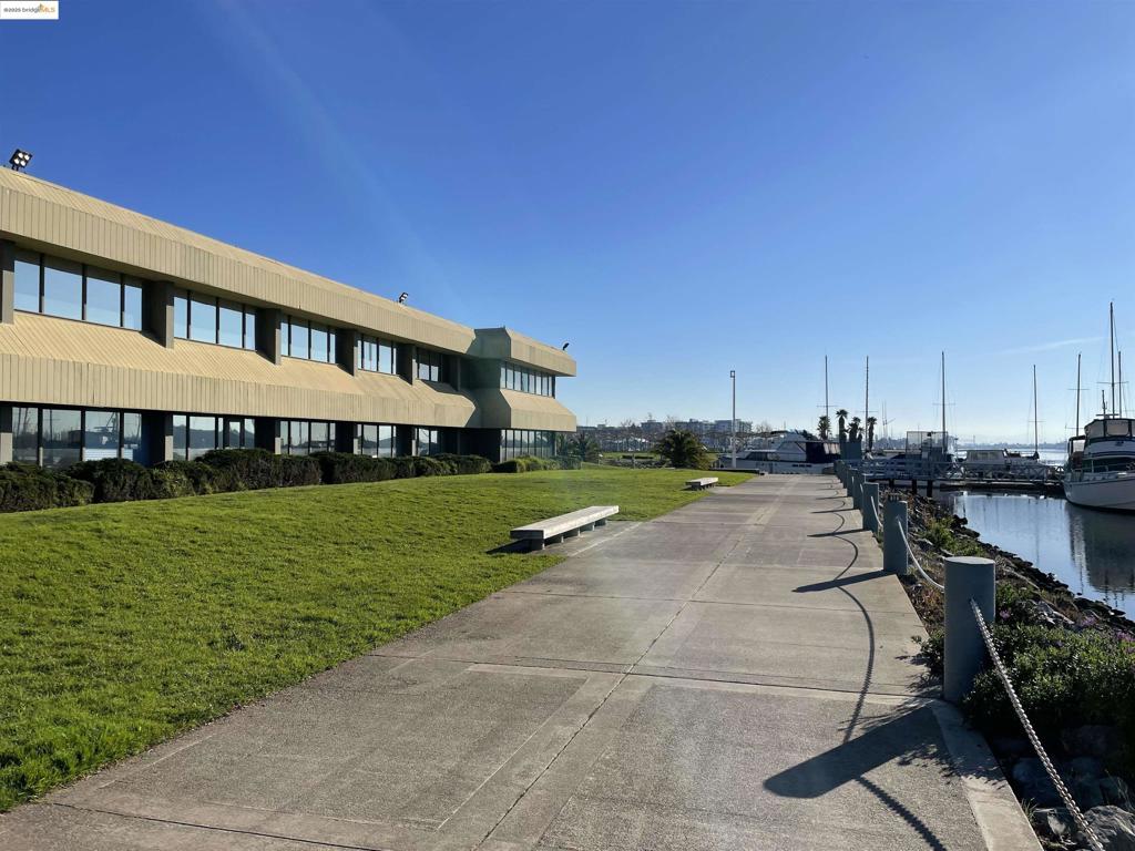 Top Floor Waterfront Corner Office Condo with Sweeping Views. Renovated with kitchenette and move-in ready. On-site parking, gym, and pool. Spacious multi-room layout. Boat slip can be sold with the condo.