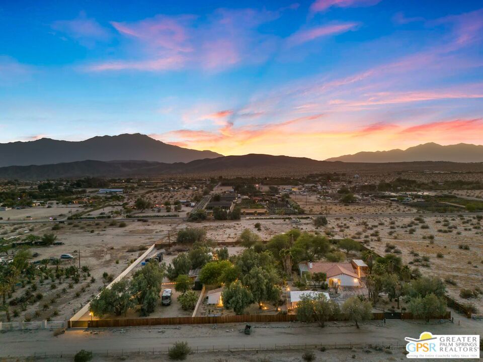 ** Sky Valley Oasis A Private Wellness Retreat & Luxury Desert Compound ** Escape to Sky Valley Oasis, a secluded resort-style sanctuary where luxury meets tranquility. Behind electronic gates lies a breathtaking retreat that feels worlds away from everyday life, yet just 15 minutes from shopping, dining, and Palm Springs International Airport.At its heart is a beautifully remodeled main residence with an attached casita and a separate guest house with a full kitchen and private yard. For an unforgettable glamping experience, two elevated, climate-controlled tents with private verandas overlook the serene desert. The property also features two full hook-up RV sites, comfortably sleeping 16+ guests perfect for family, friends, or income potential.What makes Sky Valley Oasis truly unique is its private geothermal mineral well, delivering therapeutic 84-degree water to custom soaking tubs and outdoor showers scattered throughout the grounds a true wellness experience. Powered by solar, the property embodies sustainability and serenity in perfect balance.Wander lush, irrigated pathways beneath 30-year-old trees, past exotic cacti gardens and a custom rock pond with streams, a footbridge, and misty ambiance. Elevated redwood decks offer spaces to lounge, nap in a hammock, or gather around firepits, outdoor bars, and BBQ kitchens.Whether you're dreaming of a private residence, multigenerational compound, boutique Airbnb, or health retreat, Sky Valley Oasis offers endless possibilities turnkey furnished, right down to the bathrobes. This is more than a home; it's a lifestyle, a retreat, a rare desert gem designed to elevate your connection to the land, the moment, and yourself. This hidden section without isolation, close to all the greater Palm Springs has to offer. Yet peacefully removed from the noice from everyday life.