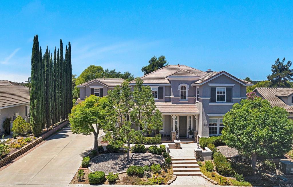 Located in the heart of Fallbrook’s gated Peppertree Park community, this beautifully updated home offers spacious living and a fully permitted detached ADU—ideal for extended family, guests, or rental income. The main house features luxury vinyl plank flooring, fresh interior/exterior paint, and an open-concept layout filled with natural light. The stylish kitchen has been completely renovated with quartz countertops, updated white cabinetry, stainless-steel appliances,modern fixtures and a working pantry. An adjacent breakfast nook flows from the kitchen to the outdoors, creating the perfect space for everyday living and entertaining. Downstairs features a living area, dining room, family room, kitchen with breakfast nook, plus a bedroom and full bath, perfect for guests or multi-generational living. Upstairs, enjoy a versatile bonus room—great for a home office, playroom, or media room. The spacious primary suite features a private seating area with a double-sided fireplace and French doors that open to a private covered balcony. The en-suite bath includes quartz counters, large-format porcelain tile, updated vanities, and modern fixtures. A remodeled Jack and Jill bath serves the secondary bedrooms with updated tile, tub, and finishes. Above the detached 3-car garage is a fully permitted 1-bed/1-bath ADU with its own private entrance, kitchen, living area, walk-in closet, washer/dryer, and AC. Interior upgrades include luxury vinyl flooring, recessed lighting, quartz counters, porcelain tile, and shaker-style cabinetry. Peppertree Park residents enjoy a 6-acre gated community park with walking trails, playground, basketball court, and BBQ areas. Conveniently located near schools, shopping, and outdoor recreation.