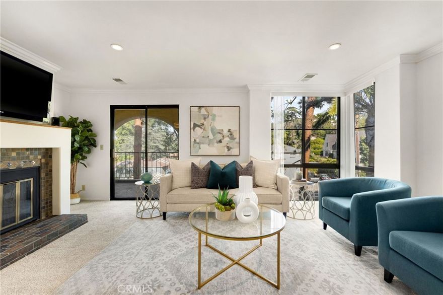 Awesome Views, Spacious Single Level, elevator access, located in the Prestigious Murphy Hill development with gated entry.  This light, bright, Open Floor Plan with 2 Bedrooms and 2 Baths, located on the second floor, is ready to Impress starting from the moment you drive up to the Gated Entry and catch a glimpse of the gorgeous mature Trees and Landscaping. As you enter through the double doors of this charming home, you will be greeted by the Open Floor Plan flooded with nature light and Alluring view. Living room has a cozy fireplace, nearly floor to ceiling windows, recessed lighting, crown molding, great balcony, and fabulous view.  Balcony access from the living room creates a peaceful flow from inside to out and feels like an extension of the living room.  The dining area is open to the living room and kitchen which creates an integrated space for every day living and great for entertaining. Inviting kitchen with pantry and updated countertops and Backsplash.  The Large Private Primary suite with awesome view and full Bath feels like a private retreat. Primary Suite features include a large closet with mirrored wardrobe doors and additional built-in cabinet which is impressive.  Primary Bath is a full bath with shower in oversized jetted tub.  Second bedroom has a French door entry, walk-in closet, recessed lighting, crown molding, and cute balcony which overlooks a beautiful fountain.  The second bath is also a full bath with a shower in a tub.  And yes, there is an Inside Laundry area with shelving which is so convenient. All this with Elevator access to your Two subterranean parking spaces. Located in Beautiful Murphy Hill with Resort Style Pool and Spas, close proximity to Quaint Uptown Whittier, Whittier College and Hiking Trails makes it a must see. If this is not enough, you will have No Water Bill or Trash Bill making this an exceptional opportunity for you to make this your Home!