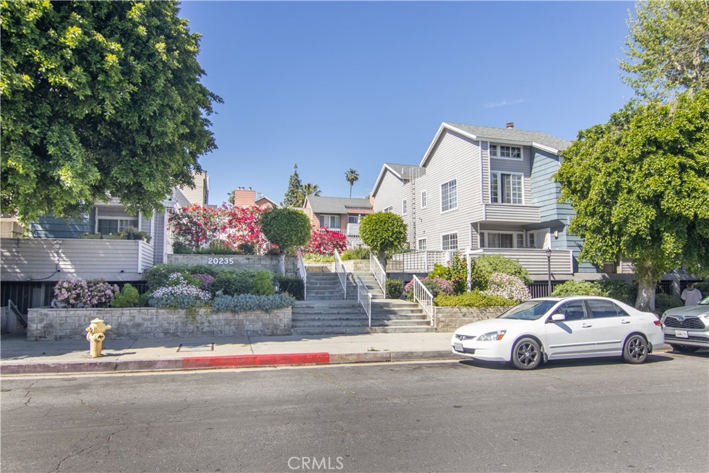 Motivated Seller!!! Priced Reduced!!! Great Winnetka Location! Don't miss this Keswick Villas, Spacious 2 Bedroom, 2 Bathrooms Condominium. Great Open Floor Plan features Bright Livingroom with fireplace and Big Windows with Sliding Glass door to Huge Balcony, the Kitchen with Pantry and Dining Area with ceiling fan. Primary bedroom has 2 closets and an ensuite bathroom with walk-in Shower. Good-sized secondary bedroom as well. Hall bath with tub/shower combo. Indoor Laundry Room features extra storage and room for side-by-side washer and dryer. This popular gated complex has a large pool area with spa, just perfect for those warm summer days. 2 car secure tandem parking spaces plus plenty of guest parking in the subterranean garage as well. Close to shopping, transportation, parks, etc. Great financing option available for first time buyer. Hurry, it won't last!