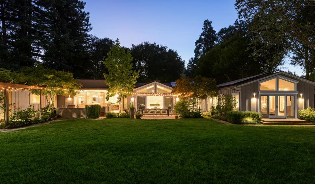 Welcome to this like-new home on a gorgeous level one-acre lot in the heart of central Portola Valley. Extensively renovated and expanded 4 years ago the layout creates the feeling of a compound with a 4-bedroom + office, family room with Murphy Bed, guest house with kitchen and bath, detached 2-car garage, plus additional garage converted to a fabulous gym. At the center of it all is a vast lawn, solar-heated pool and spa, suana, waterfall, fire pit terrace, playground, outdoor kitchen, plus your own farmers market with vegetable beds, myriad fruit trees, and chicken coop. This home is absolutely perfect for todays work-from-home, distance learning, fitness, and recreation needs all in one place with privacy, yet with walkability to acclaimed Ormondale Elementary plus minutes to shops and restaurants.