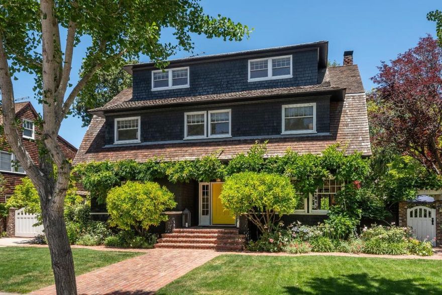 The epitome of timeless elegance on a pristine block of the renown Professorville district. Exquisitely proportioned and finished, this center-hall design provides continuity to the exceptional six-bedroom floor plan. Restored finishes capture the original detailing in hardwood surfaces and mill-work. The exceptional kitchen with large island and adjoining butlers pantry, plus each of the bathrooms, have been remodeled to perfection. The allure of this property continues into the magical backyard complete with brick terraces, heritage trees, and lush landscaping. This area is completed by the detached garage with both front and alley access. In addition there is a delightful greenhouse featuring a separate planting station. Whether it is the timeless elegance of style, the center-hall floor plan, exquisite finishes used in restoration, or the gorgeous grounds, this property is one which will truly continue to maintain trophy caliber.