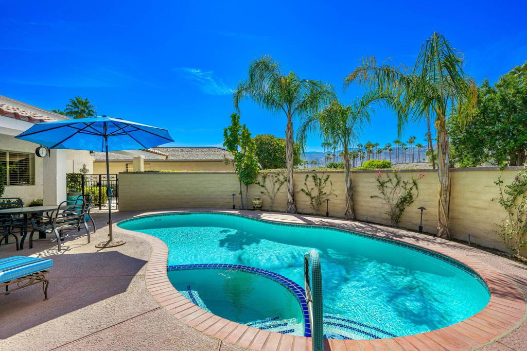 Welcome to your new oasis at The Springs Country Club! This stunning home offers you the chance to indulge in over 3,000 square feet of luxury living with a detached St. Andrews floor plan, fully available TURNKEY FURNISHED.As you step inside, you'll immediately be drawn to the front-loaded pool and spa, expertly designed to offer breathtaking west-facing mountain views. This beautiful, 3-bedroom, 3-bathroom home boasts an updated kitchen, complete with a walk-in pantry and a sleek, modernized bar area, making it perfect for both cooking and entertaining.The thoughtfully crafted layout provides ample storage space and includes a versatile office/den that can be tailored to your personal needs. The spacious dining room opens directly to the expansive backyard, creating a seamless indoor-outdoor transition ideal for gatherings and dining al fresco.The backyard is truly an entertainer's paradise, with plenty of room to host lively outdoor events or even cultivate your own garden sanctuary. Whether you're planning a weekend barbecue or simply savoring a quiet evening under the stars, the backyard setting offers unmatched peace and ambiance.Designed to perfectly balance relaxation and recreation, the home also provides ample parking with an expansive driveway and unmatched convenience, making it an ideal retreat for any lifestyle. Experience true luxury and make this beautiful home in The Springs Country Club your own private haven. Your dream oasis awaits!