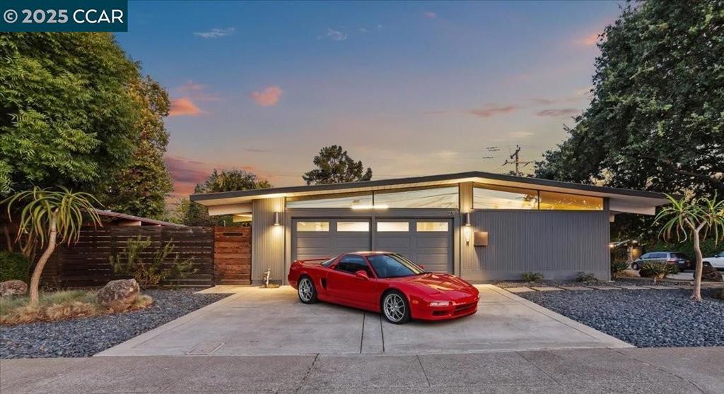 This stunning Eichler is located in Walnut Creek's desirable Rancho San Miguel neighborhood. Its custom kitchen is true to the original Eichler design and features modern wood cabinetry, white quartz counter tops, tile backsplash, stainless appliances including built-in oven, microwave and refrigerator, and a central island with a built-in walnut dining table. The open family room offers floor to ceiling windows, a sliding door to the backyard and abundant natural light. The large flex space next to the kitchen is perfect for an in-home office, play room or guest suite with its sliding pocket doors. The primary bedroom is spacious and bright and features an updated spa-like bathroom. This home's special features include: polished concrete floors throughout, recessed lighting, central heat and air, dual pane windows, foam roof, solid core doors, closet systems, updated electrical, abundant storage, over-sized two-car garage, and upgraded low maintenance landscaping including artificial turf. This is a must see home served by wonderful (Northgate) Walnut Creek Schools. Convenient to restaurants, shopping, parks, and trails. First showings on Thursday, August 7th. Open Saturday and Sunday 1:00 to 4:00.
