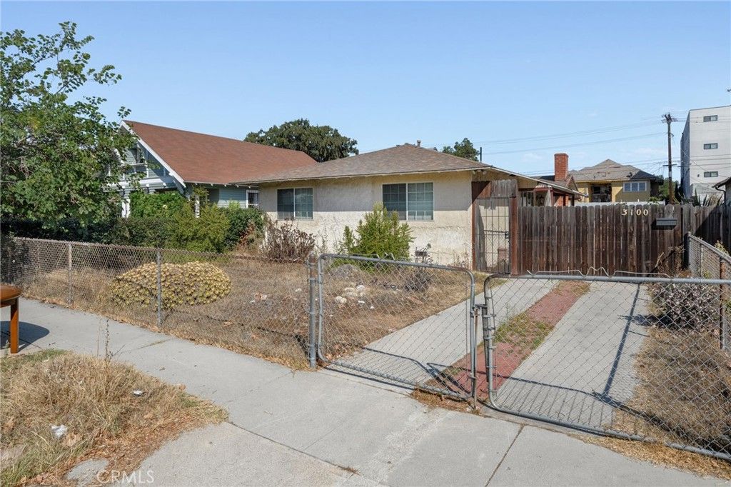 Photo of 3100 Brighton Avenue, Los Angeles, CA 90018 (MLS # PW25235229)