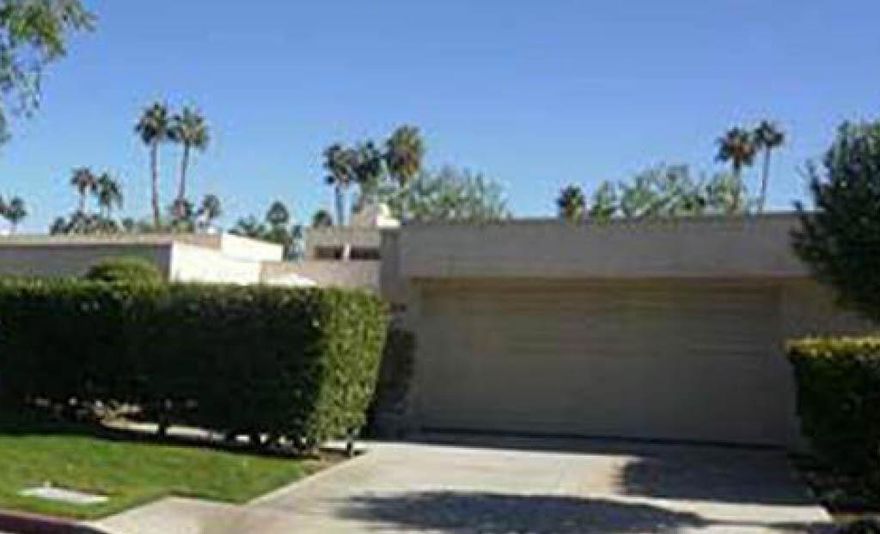 Location plus! FEE SIMPLE (not leased land) in desirable south Palm Springs.  This rarely offered single story Plan D model is one of only four in the Versailles community, conveniently located across the street from Smoke Tree Plaza.   As you enter property, there is a private enclosed and tiled front courtyard patio; perfect for lovely Happy Hour views  of Mt San Jacinto. Once inside the home you'll notice the Open Floorplan with very high ceilings, recessed lighting, onyx granite fireplace & wet bar and clerestory windows, making it light & bright. The kitchen & breakfast bar has direct front courtyard access and with slab granite counters and maple cabinets it's a great space to cook while entertaining. Nice separation of bedrooms with private patios off each one. The baths both have granite & glass enclosures. Two car garage with direct access. Four pools & spas plus two tennis courts.  The square footage may actually be larger to an earlier reported sale size showing 1,602 SqFt, which may have come from the expanded dining room (former atrium?). Professional photos and video coming January 6, 2026.