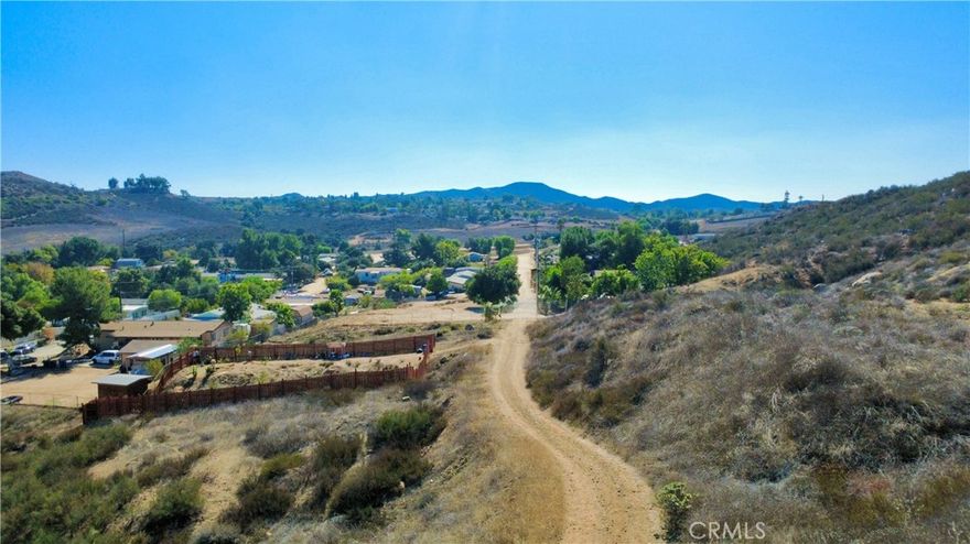 Discover the perfect opportunity tucked just east of the 15 Freeway off Bundy Canyon Road! This beautiful piece of land offers endless potential — whether you dream of building your own manufactured home surrounded by peaceful hills and trees, or you’re looking for a smart investment to hold and develop later. Imagine waking up to hillside views and the quiet charm of nature, all while still being close to town and major routes. The landscape gives you room to get creative — design your dream home, set up a cozy retreat, or develop something special to sell for profit. With its great location and natural beauty, this property invites imagination and opportunity at every turn.