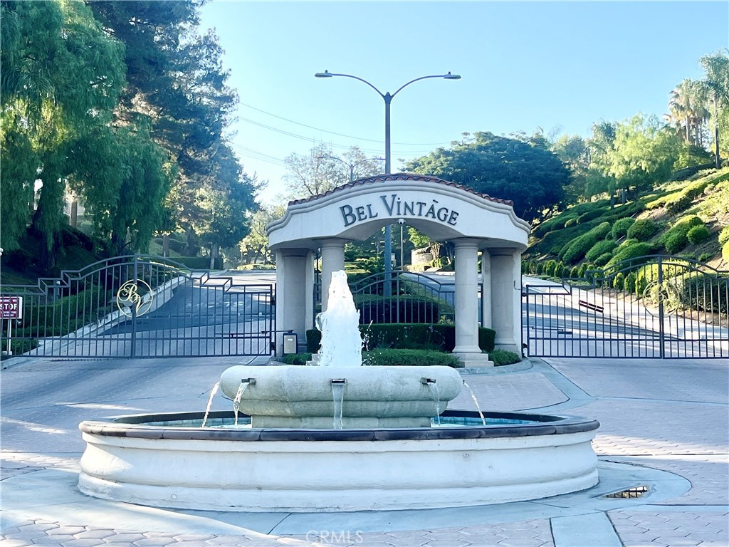 BEL VINTAGE HOME, PRIVATE GATED COMMUNITY. ENTERTAINERS DELIGHT. OPEN FLOOR PLAN, LUSH LANDSCAPING W/ PREMIUM LOT AND PRIVATE REAR YARD. BUILT IN BBQ, MARBLE FLOORING. BUILT IN SURROUND SOUND, WROUGHT IRON STAIRCASE, FRENCH DOORS, CROWN MOLDING & PLANTATION SHUTTERS. MASTER BEDROOM W/ CUSTOM WALK IN CLOSET. VIEW FROM UPSTAIRS.
