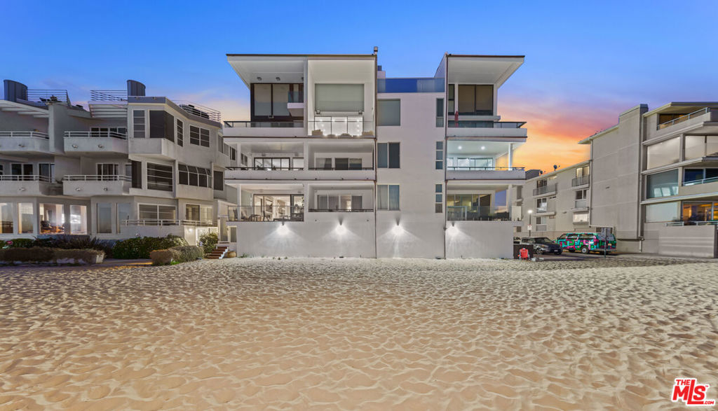 **This is the only unit in the building with direct sand/beach access** Stunning ocean front condo with private teak staircase to the sand for lease (fully furnished). This architectural unit occupies the Northwest corner of one of the most desirable buildings on the Marina Peninsula, which has been extensively renovated. This condo has been professionally designed and remodeled and features: large open living room-dining room with fireplace, high ceilings and huge sliding doors which open to a private balcony, with head-on ocean views extending from Catalina to Malibu and stairs to the beach; 3 Bedrooms, 2 bathrooms, including a beautiful primary suite with oversized shower and soaking tub; sleek, designer kitchen; hardwood floors; security system with cameras; in unit laundry; Sonos sound and speakers throughout. 100% turnkey and fully stocked with linens, blankets, dishes, silverware, pots/pans, beach towels, beach umbrellas, TVs and accessories. Luxury is in the details. Rarely does a condo of this quality become available for lease. Please note: minimum 1+ year lease term and only available furnished.