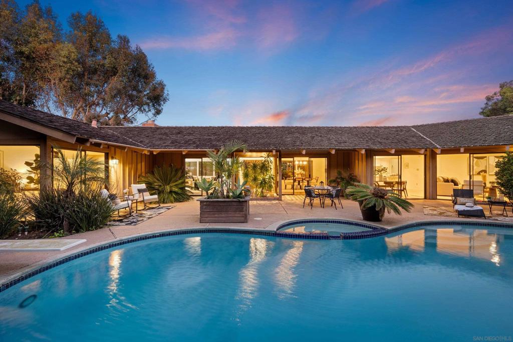 Welcome to this beautifully designed family retreat nestled in the private and quiet Hidden Valley neighborhood. This home offers a thoughtful layout, with a private wing for the parents and a separate space for the kids on the opposite side of the house. With five bedrooms plus an optional office, there’s plenty of room for everyone. Outside, you’ll find four unique yard areas and a lovely pool, perfect for relaxation and entertaining. You’re just a five-minute drive to La Jolla Shores and have easy access to the 5 Freeway and the 52. Plus, the property includes a three-car garage and a spacious driveway, offering ample parking. It’s truly a convenient and serene place to call home.