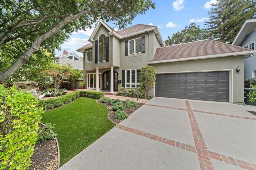 Located within a coveted neighborhood, a mere mile from downtown Redwood City, this home seamlessly marries classic traditional appeal with updated designer flair. The stately design begins at the entrance with exterior window shutters and Doric columns. Privacy from the street is assured by tall hedges that frame the front gardens offering an enchanting spot for outdoor gatherings. Inside, hardwood floors extend throughout, complemented by the timeless elegance of crown moldings and recessed lighting, while California window shutters add a touch of designer appeal in select rooms. Recent updates throughout are numerous, including all-white kitchen cabinetry with granite countertops, and pristine bathrooms highlighted by the sumptuous primary suite bath adorned in Carrara marble with a free-standing tub and separate shower. Eco-friendly synthetic lawn in the front and rear yards plus a professional quality sport court were also added. Oversized 2 car garage ~530 sq.ft.