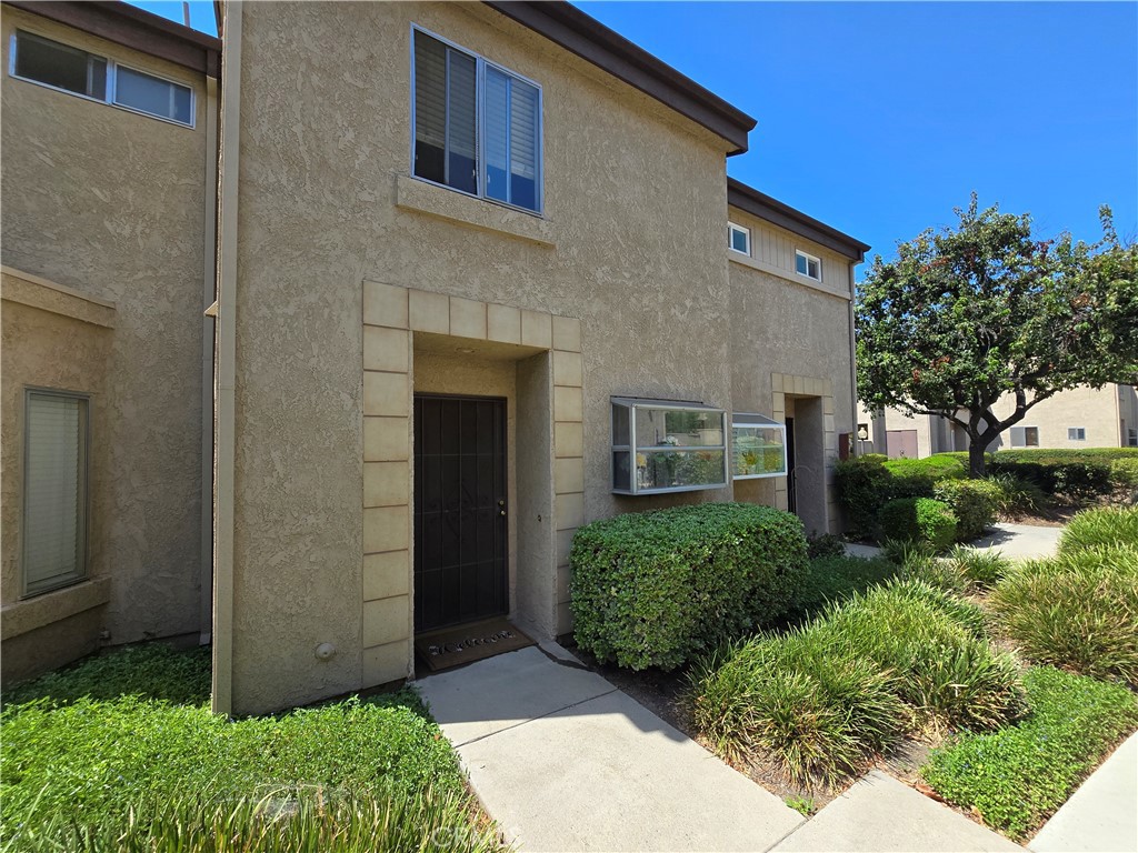 Welcome to Park Francis! This inviting two-story condominium features TWO SPACIOUS PRIMARY BEDROOMS, each with its own full bath, plus a convenient half bath on the main floor. The home offers a bright and open feel with high ceilings throughout, creating an airy and comfortable living space. The kitchen has been updated with newer cabinets, countertops, and flooring, while one bathroom has also been partially upgraded. A private courtyard sits between the home and the two-car garage with semi-direct access ... perfect for BBQs, entertaining, or relaxing evenings. Nestled within a tranquil gated community, this condo is an excellent opportunity for first-time buyers or investors, offering the potential to add your personal touches. Conveniently located near schools, shopping, dining, and freeway access, this is a fantastic chance to own in the heart of Ontario.