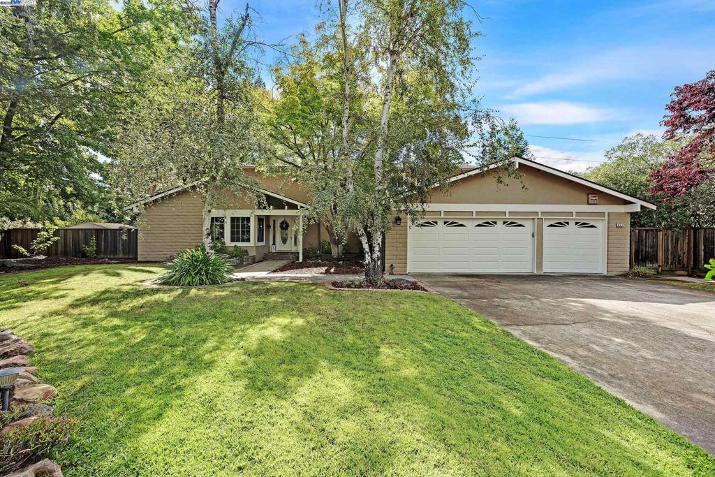 Welcome to this spacious 5-bedroom, 3-bathroom home on a rare 0.436-acre lot in Danville—almost half an acre! One full bedroom and bath are conveniently located downstairs, perfect for guests, multigenerational living, or a private office. Step inside to a cozy family room and a thoughtfully designed kitchen, ideal for everyday living, with a formal dining area and a charming formal living room for entertaining. Outdoors, enjoy a true retreat with a built-in kitchen and jacuzzi, making it the perfect setting for gatherings and relaxation. The expansive lot still offers endless possibilities—build an ADU, create a resort-style backyard, or simply enjoy the open space for outdoor activities. Located near top-rated schools, freeway access (680), the Danville Livery, and downtown, this home combines comfort, space, and a prime location. This is a rare opportunity to own a large, versatile property in one of Danville’s most desirable neighborhoods.