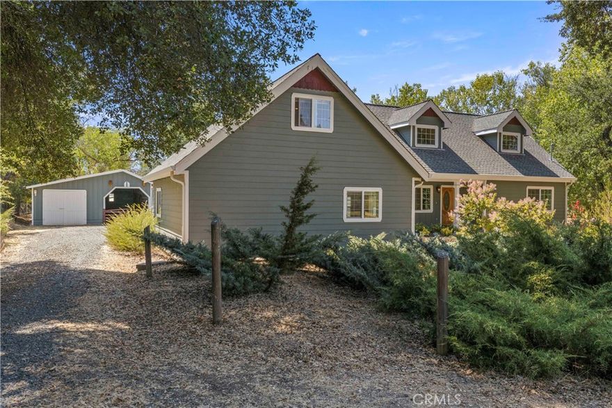Welcome to this inviting property that perfectly combines comfort, functionality, and country charm.  The custom built Cape Cod Style "Bride's Home"  features beautiful hardwood floors(just refinished), crown molding, and abundant natural light throughout. A cozy fireplace anchors the living area, while a custom tile entry and detailed inlay showcase quality craftsmanship. The kitchen offers rich wood cabinetry, a stone backsplash, and tile flooring, plus a passthrough bar that connects seamlessly to the main living space, along with a sunny and inviting dining area. The main level offers the primary suite with walk in closet, and full bath with shower/tub combo and linen storage. Upstairs there are two charming guest bedrooms with brand new never lived in carpet, spacious landing with floor to ceiling built in cabinetry for endless storage, and the full guest bath. The property is ideal for animals, gardening, and hobby farming, perfectly landscaped with drip systems, established varieties of oak trees, willow, and cottonwoods. A seasonal creek which attracts wildlife, separates the house from the pasture areas, creating a nice space between. The detached two-car garage with a loft provides potential for additional living space, while the barn with a tack room offers excellent space for livestock, storage, and equipment parking. Multiple outbuildings include a well house, greenhouse, livestock shelter, and additional storage structures—perfect for all your projects and passions. A desirable and sought after location, all within a serene setting designed for both everyday living and country lifestyle.