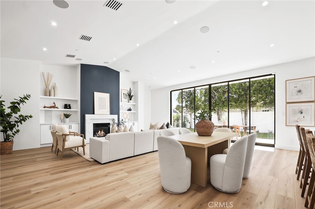 Located in the Coveted Newport Beach neighborhood of Dover Shores this BRAND NEW CONSTRUCTED 2025 Residence is Thoughtfully Curated & Intelligently Designed with a Warm Modern Vibe blending Organic Charm with a Coastal Lifestyle. This completely reimagined Single Story Residence Offers 4 Bedrooms, 4.5 Bathrooms, MASSIVE 3 CAR GARAGE, and a Multi Use Creative Nook. The Attention to Detail & Quintessential California Cool Aesthetic are immediately noticed upon entry through the Oversized 9ft Dutch Door. Creating an iconic California indoor-outdoor flow Paradise is found in the heart of the home. The Great Room encompasses 20' Slider, Vaulted Ceilings, Custom Woodwork Feature Walls, Surround Sound Speakers & Subwoofers, and Fireplace. Cohesively Blending into the Coastal Quiet Luxury Aesthetic of the home is the Entertainers Dream Kitchen, with an Abundance of Floor to Ceiling Cabinets, 48” Commercial Grade Gas Range w/ Custom Hood, Built in 48” Refrigerator, Built in Double Oven, Waterfall Quartz Island, Neutral Artisanal Mosaic Tile, & a Custom Bar Nook w/ Ice Maker & Wine Fridge. The Intelligent Design of this home is highlighted by the subtle hidden entrance to your Primary Suite Retreat. The Primary Suite Retreat will leave you well rested & calm with the coastal breeze coming through the 8.5’ Pocket Slider & into the Spa Like Primary Bathroom featuring a Restorative Shower Digitally Controlled 2 Rain Heads & 4 Body Sprays, Whirlpool Tub, Designer Tile and Spacious Custom Walk In Closet. Away from the Primary, the left Wing of the house features 3 En Suite Bedrooms all Curated with Cohesive Modern Designer Details, and an Office. The Peaceful, Private and Professionally Landscaped Backyard features Multiple Seating Areas, Turff, Built In BBQ Island & Grill, & the Custom Stone Artisanal Fire Pit. Additional Modern Day Upgrades include Modern Metal Roof, 2 TESLA POWER WALLS, SOLAR, Halo 5 complete Water Filtration System, Tankless Water Heater, Sound Deadening Insulation, Cat6 & Hardwired Wi-Fi extenders. Do not forget The Masterfully Designed, MASSIVE 823sqft 3 CAR GARAGE complete w/ Epoxy Flooring. Incredible Home...Come see this one in person!