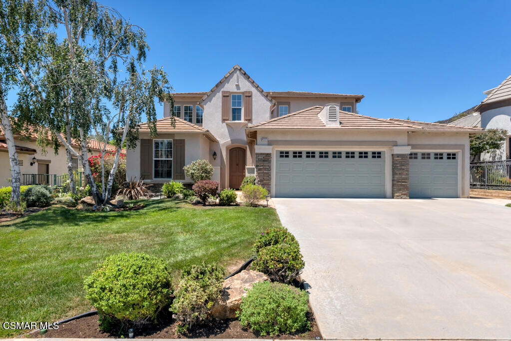 Ideally situated in the heart of Dos Vientos, just moments from parks and top-rated schools, this beautifully maintained home showcases true pride of ownership. Light-filled and spacious, the open-concept floorplan includes a highly desirable full bedroom and bath on the main level--perfect for guests. The formal living room impresses with soaring vaulted ceilings and an abundance of natural light streaming through large windows. The kitchen is bright and functional, featuring neutral almond tile counters and backsplash, stainless steel appliances, a generous center island, and a large pantry. A butler's pantry conveniently connects the kitchen to the formal dining room--ideal for entertaining. The inviting great room includes built-in cabinetry, a media wall, fireplace, and elegant crown molding, creating a warm and welcoming space to gather. Step outside to a peaceful, private garden yard, thoughtfully landscaped for beauty and serenity, and nicely screened from neighboring homes. A spacious 4-car garage offers ample storage and room for all your toys and hobbies.