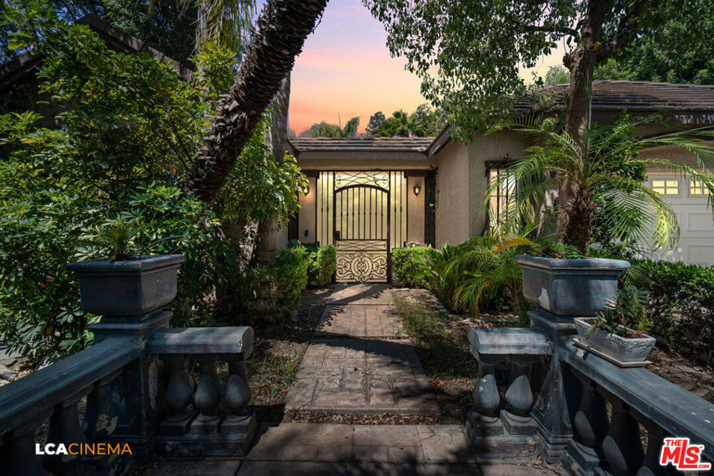 Discover a serene tropical oasis with this exquisite Chinese garden inspired Home , It has a seeded glass & Iron courtyard entry Nestled amidst lush greenery and exotic flora, the pebble tec pool has a Jacuzzi , Grotto and 2 waterfalls , There is a built in BBQ , Gazebo and much more , The open concept home has backlite Quartz wall panels Mosaic scenes on ceilings , stone , brick, ceramic and wood details every room , Stained glass , Unique Light fixtures from Europe . Granite countertops , Stainless Steel appliances .Every inch of this home is customized , It even has a Gold Toilet , This is truly a One of a kind Home ;Located in the highly rated Rosedale school District and Prestigious Liberty High school .