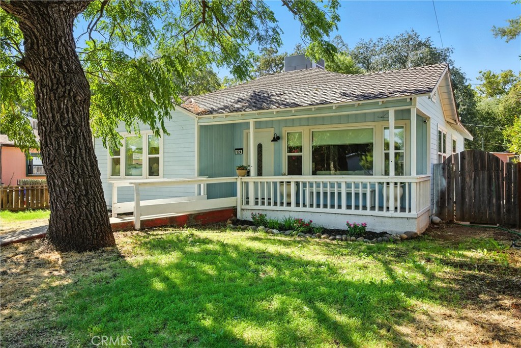 Two Homes on One Lot in the Heart of Chico’s Barber District! This rare find combines classic Chico character with modern updates and incredible income potential. Whether you’re an investor, looking for multi-generational living, or simply want a property where rental income can help offset your mortgage, this opportunity is one you won’t want to miss. The front home is a 2-bedroom, 1-bathroom charmer with an additional bonus room that can serve as an office, den, or even a third bedroom. Inside, you’ll love the original hardwood floors, large picture windows that fill the space with natural light, and an updated kitchen featuring crisp white cabinetry, marble-look counters, stainless steel appliances, and a gas range with a view of the backyard. Peace of mind comes easy with a newer central HVAC system and a 60-year composition shingle roof, both installed in 2021. Tucked away at the rear of the property is the second home, a private studio unit complete with its own kitchen, bathroom, and living/sleeping area. With both alley and backyard access plus a dedicated parking space, it’s ideally set up for rental income, a guest retreat, or even an artist’s studio. Outdoor spaces add even more appeal, from the fenced front yard and welcoming porch perfect for morning coffee, to the backyard with room for storage, a garden, or simply a place to relax. And the location? Unbeatable. Just blocks from Chico State, Chico Country Day School, Rotary Park, and Downtown Chico’s shops, restaurants, and events, you’re at the center of one of Chico’s most premier and historic neighborhoods. Whether you’re searching for an income-producing property or a versatile home with classic Chico charm, this Barber District gem with two homes on one lot checks all the boxes.