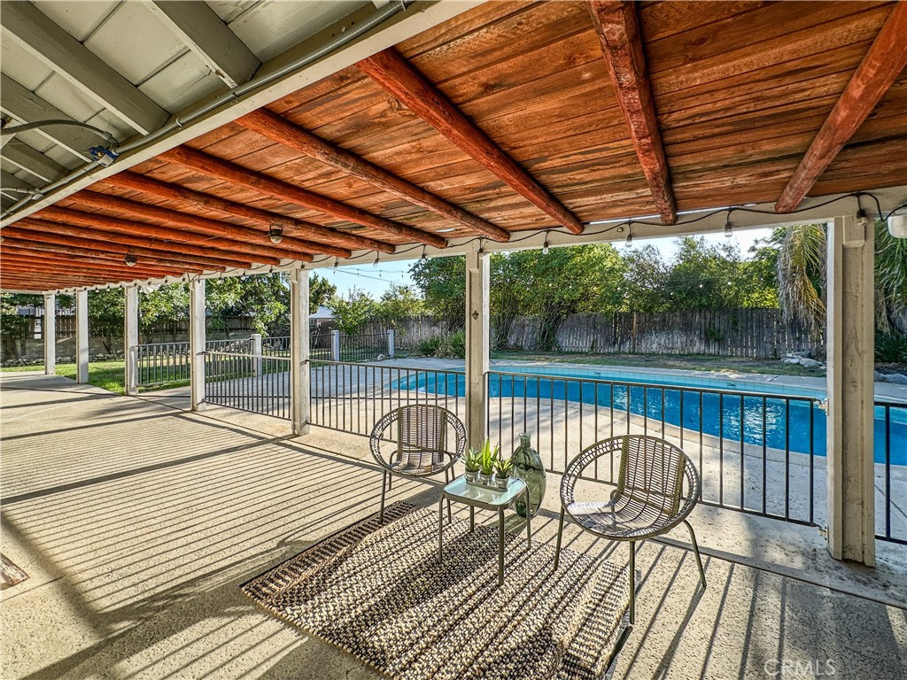 Beautifully upgraded 4-bed, 3-bath Claremont pool home on a spacious 11,333 sq ft lot in a prime neighborhood. This 2,120 sq ft move-in ready home features hardwood floors, French-style windows, energy-efficient ceiling lights, and thoughtfully painted interiors. The open-concept layout flows into a fully remodeled chef’s kitchen with a massive island, six-burner gas stove, double ovens, ice maker, double-door fridge, soft-close drawers, LED lighting, water filtration, and a hidden walk-in pantry with direct garage access.
The primary suite offers a spa-like bath with soaking tub, shower, LED lighting, and a large walk-in closet with custom shelving. Three additional bedrooms include themed kids’ rooms (pink and blue), plus pre-mounted TV brackets in 3 bedrooms and the living room. All bathrooms feature hot/cold water. A high-efficiency HVAC system, centralized AC/heat, washer/dryer, and well-placed outlets throughout add everyday ease.
Outside, enjoy a heated/cooled pool, large backyard, big front yard, wide side yards perfect for landscaping or gardening, attic storage access, and exterior outlets for holiday lights. The expansive driveway fits 3–4 SUVs, and the 3-car garage includes a Tesla charger. Ring cameras offer full-property security.
With scenic mountain views, proximity to Claremont Village, top schools, parks, Metro, and easy freeway access, this home offers premium upgrades, thoughtful design, and exceptional value. A rare opportunity—schedule your private showing today!