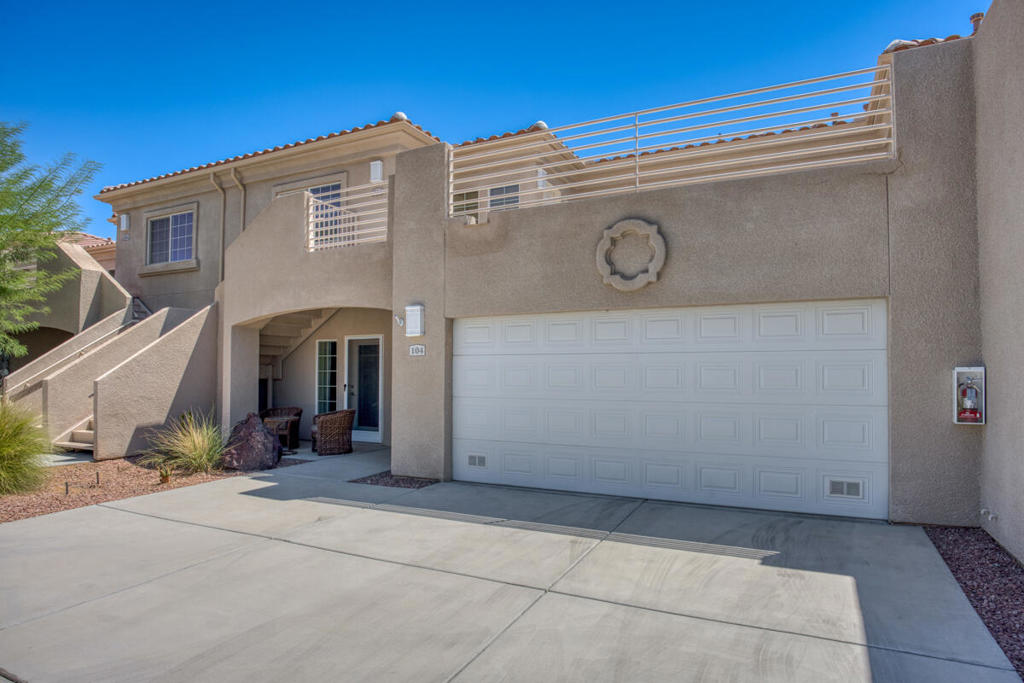 Move-in ready 2 bed, 2 bath single level condo located in the gated Cimarron community offers a spacious and open floor plan, a neutral paint scheme, an attached 2-car garage, and in-unit laundry with included washer and dryer. The living room and family room offer an abundance of natural light, a ceiling fan, and a glass door to the private patio. The kitchen offers wood cabinetry, stainless steel appliances with included refrigerator, gas range, microwave, and dishwasher, and there is breakfast bar seating as well as a dining area. Both of the bedrooms are primary suites and feature private bathrooms, they are both generously sized, and offer privacy as they are separated by the bathrooms. Each bedroom also features a private entry to the outdoor patios in the front and back of the home. The back patio offers views of the community amenities including the pool/spa and greenbelt area. Conveniently located near shopping, dining, and immediately adjacent to the 36 hole Cimarron Golf Course. Schedule your private tour today!