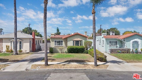 Photo of 8823 S Wilton Place, Los Angeles, CA 90047 (MLS # 26873303)