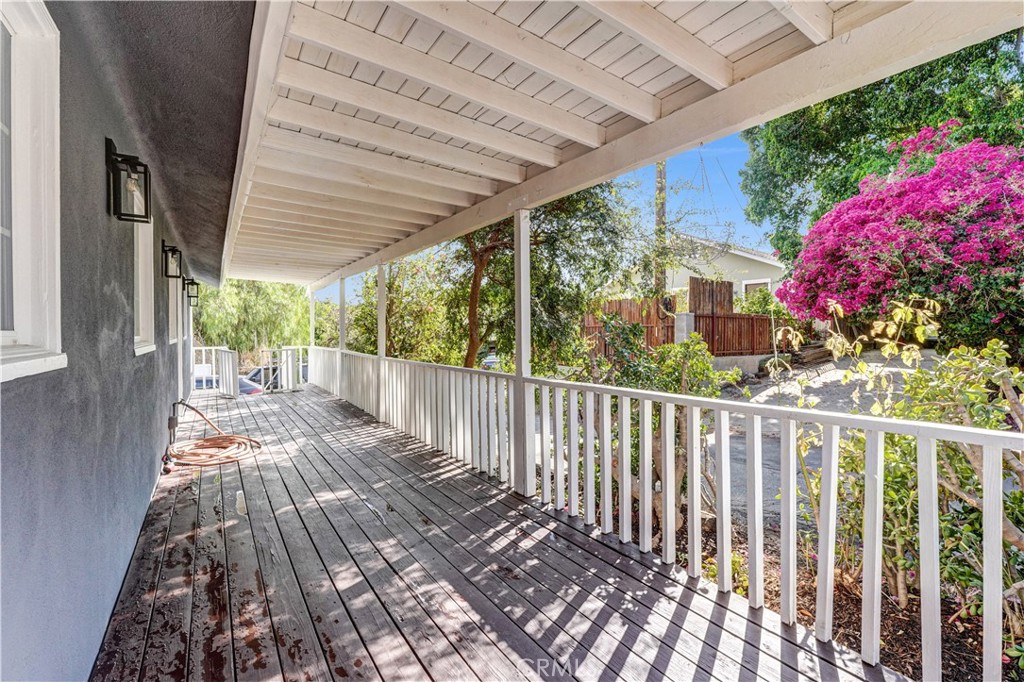 Discover this rare opportunity to own a inviting 2-Bedroom + 1-Bath Home in Picturesque Lake Manor area of Chatsworth just minutes West of Topanga Canyon Blvd.
This delightful home features a Very Large Front Porch with on a Private Street, Wood Deck in the back Yard with Plenty of Room for an RV, Boats, Work Trucks or Recreational Equipment. The low-maintenance landscaping provides added flexibility for potential expansion or the addition of an ADU.
The Updated Interior Showcases New Wood-Style Vinyl Flooring, Newer Dual Payne Windows, Copper Plumbing ,Fresh Paint Inside and Out, Mirrored Closet Doors, and a Laundry Area inside the Home.
Step Outside and enjoy the Breathtaking Views and the Small Town Neighborhood that create a Very Special Country Lifestyle. There is a Community Convenience Store just a 2 minute walk. Lots of Walking and Hiking Trails.....
Come home to this Peaceful Updated Gem tucked away, yet only a few minutes from Central Chatsworth, West Hills, Woodland Hills, and Old Town Calabasas. Conveniently located near grocery stores such as Ralphs, Trader Joe's, Whole Foods, and Bristol Farms, as well as nearby Hwy 118 and Hwy 101. This property offers a blend of country living with convenient city access.