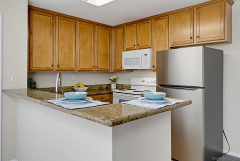 Photo of 3456 Castle Glen Dr Dr #256, San Diego, CA 92123 (MLS # 260021018SD)