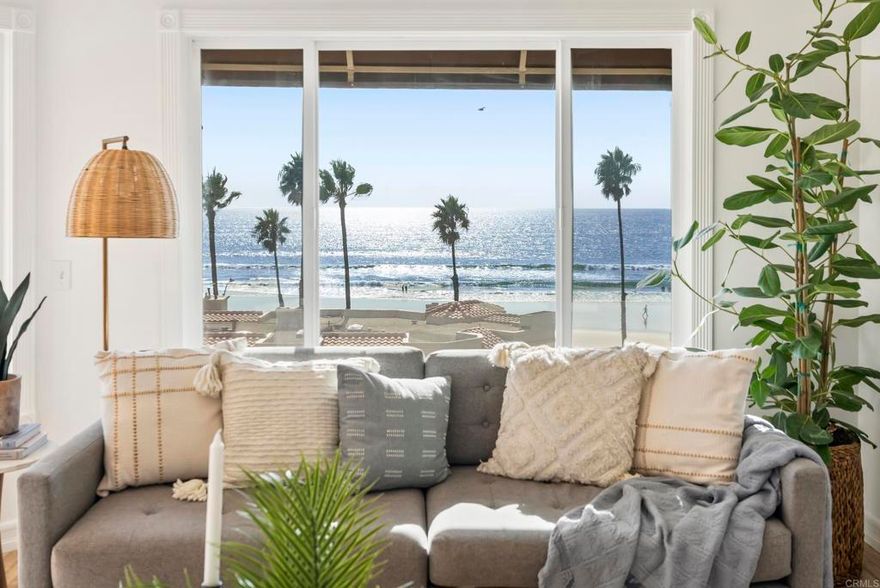 Jaw-dropping, show-stopping, sit-down whitewater, 180-degree ocean views are the centerpiece of this incredibly located Oceanside property. Perfectly situated between Pacific Street and The Strand in the beachfront community of San Miguel II, this single-level coastal retreat is elevated for privacy while capturing panoramic views stretching from La Jolla to Dana Point.   The bright, open floor plan frames endless coastal vistas, with a west-facing great room that spills out onto the balcony—your front-row seat to the surf, pier, and sunsets. The kitchen is beautifully appointed with custom granite countertops, stainless-steel appliances, and a gas range, opening seamlessly to the living and dining areas. In the living room, enjoy ocean views in one direction and a cozy fireplace in the other—perfect for relaxing evenings. Wood-look tile floors throughout are as beautiful as they are practical, ideal for sandy toes or sandy paws after a morning beach stroll. The primary suite offers generous space with a walk-in closet and an updated full bath.  Enjoy the convenience of indoor laundry, two garage parking spaces plus storage, and the security of a gated beachfront community.   Just steps from Oceanside Harbor, the pier, and Oceanside's vibrant downtown, you’ll be immersed in a thriving coastal community. Stroll to coffee shops, Michelin-recognized restaurants, boutique shopping, and yoga studios, or take in the weekly farmers' and sunset markets. Live music, art, and theater add to the energy of this dynamic beach town.  Experience coastal living at its most inspiring—where the Pacific Ocean truly becomes part of your everyday life.