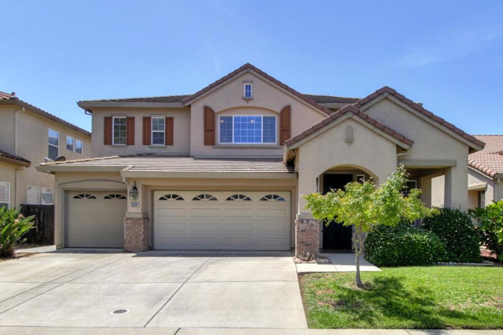 First Time on the Market! Welcome to this beautifully maintained 5- bedroom. 3-bathroom living space on a 5,775 sq. ft. lot. This spacious residence features a desirable downstairs bedroom and full bathroom, ideal for multi-generational living or visiting guest, and a bonus/ game room upstairs. Enjoy cooking and entertaining in the eat -in-kitchen, complete with granite countertops with full back splash. The interior showcases brand new Mohawk laminate flooring, custom natural travertine title flooring, fresh interior paint, and crown molding throughout. The home also includes a 3-car garage with an EV charging outlet, furnace & AC system that were both replaced in 2024, and a backyard storage shed. With a flexible floor plan perfect for families or remote work needs, this lovely cared-for-home is move-in ready and waiting for its next chapter. Dont miss this rare opportunity!