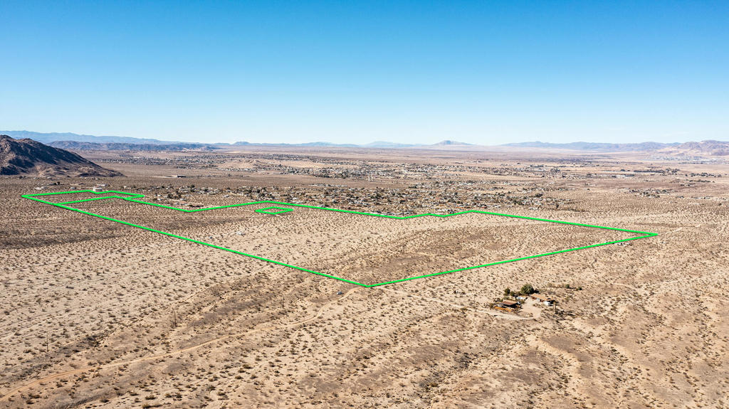 Prime Development Opportunity on 201+ Acres and Owner Will Carry Financing for serious buyer with development plan! Paved road access, utilities, and a perfect location at the base of one of the most popular National Parks in the entire USA. Two contiguous lots. City of Twentynine Palms and the surrounding mountains. This would make an amazing new home subdivision with new home potential to sell for $400,000 +. Vacation Rental Community, Class-A Resort, Luxury Camping, Horse trail community, Buyer to verify all potential uses. In the sloping foothills just south of town with outstanding panoramic views. Close to Tortoise Rock Casino and the world famous traveling destination of Joshua Tree National Monument. About 3 million tourists visit the park annually. Very close to the 29 Palms JTNM gate which is truly the best entrance point considering it's proximity to top attractions in the park such as Jumbo Rock, Skull Rock, and Keys View. Super hot short term rental market. The ideal location with potential for a resort, hotel, sub development, golf course and or gated community. So many possibilities for the right investor. APNs: 0590-151-02-0000 & 0590-151-25-0000. GPS: 34.108645, -116.036373. Don't wait on this one call now!
