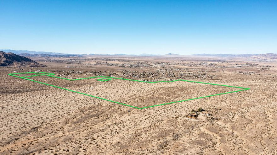 Prime Development Opportunity on 201+ Acres and Owner Will Carry Financing for serious buyer with development plan! Paved road access, utilities, and a perfect location at the base of one of the most popular National Parks in the entire USA. Two contiguous lots. City of Twentynine Palms and the surrounding mountains. This would make an amazing new home subdivision with new home potential to sell for $400,000 +. Vacation Rental Community, Class-A Resort, Luxury Camping, Horse trail community, Buyer to verify all potential uses. In the sloping foothills just south of town with outstanding panoramic views. Close to Tortoise Rock Casino and the world famous traveling destination of Joshua Tree National Monument. About 3 million tourists visit the park annually. Very close to the 29 Palms JTNM gate which is truly the best entrance point considering it's proximity to top attractions in the park such as Jumbo Rock, Skull Rock, and Keys View. Super hot short term rental market. The ideal location with potential for a resort, hotel, sub development, golf course and or gated community. So many possibilities for the right investor. APNs: 0590-151-02-0000 & 0590-151-25-0000. GPS: 34.108645, -116.036373. Don't wait on this one call now!