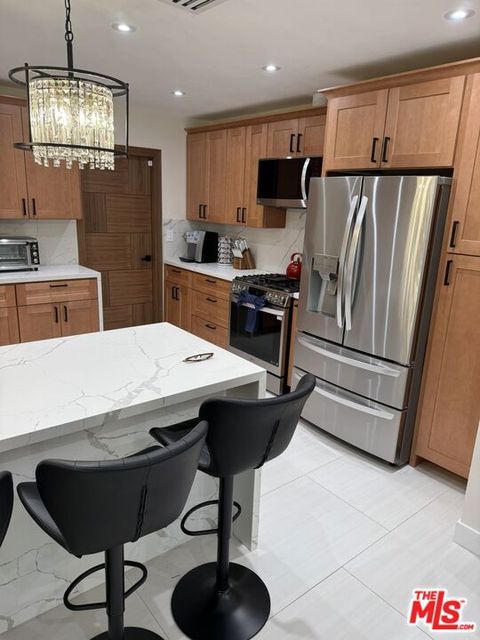 Tiny photo for 7627 Encino Avenue, Northridge, CA 91325 (MLS # 25602299)