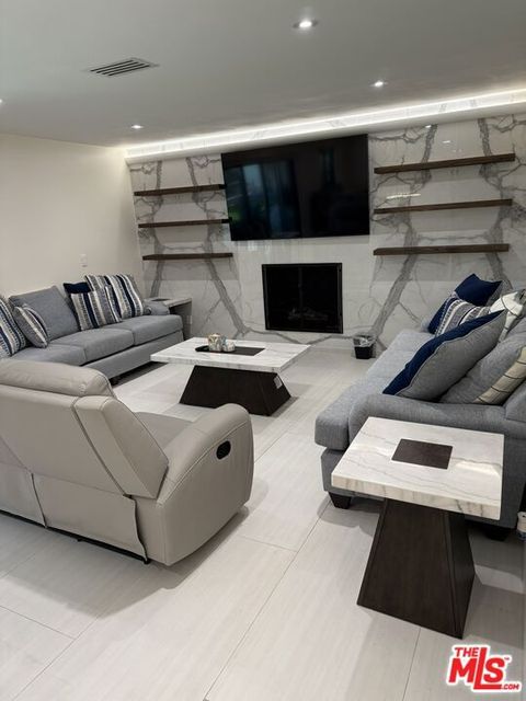 Tiny photo for 7627 Encino Avenue, Northridge, CA 91325 (MLS # 25602299)