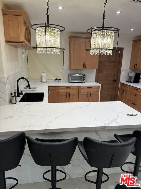 Tiny photo for 7627 Encino Avenue, Northridge, CA 91325 (MLS # 25602299)