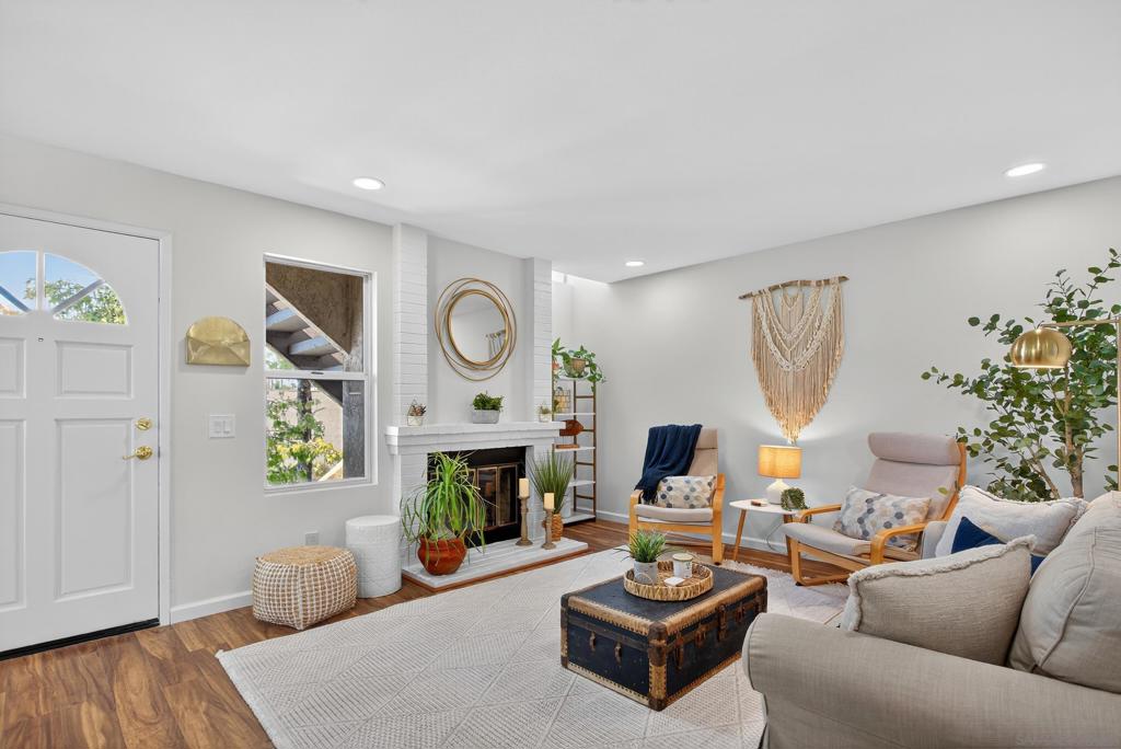 Located on the border of University Heights and North Park, this condo offers the best of two of San Diego’s most walkable neighborhoods with a Walk Score over 95. From your front door you can stroll to coffee shops, restaurants, markets, and music venues, or head into nearby Hillcrest, Mission Hills, or Mission Valley. Balboa Park and the San Diego Zoo are just minutes away, and the beach is less than 20 minutes by car. The neighborhood is known for its lively café culture, craft breweries, and local eateries that make everyday life feel like part of the San Diego experience. This light filled end unit condo has windows facing east, south, and west that bring in natural light and cool afternoon breezes. Inside you’ll find two bedrooms, two bathrooms, and a two car tandem garage. The home features laminate wood flooring, tile in the bathrooms, fresh paint, recessed lighting, ceiling fans, and central heating and AC.
