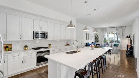 Photo of 111 Frame, Irvine, CA 92618 (MLS # OC26195817)